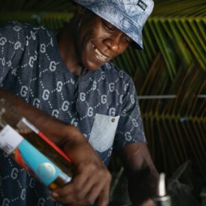 Supplier photograph: Seychelles nightlife experience — bartender mixing a drink
